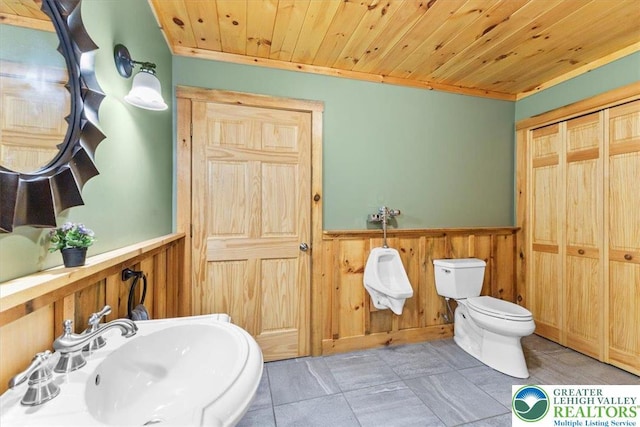 207 W Douglasville Rd, Bushkill Twp, PA 18064 - bathroom with a wainscoted wall, wood ceiling, and wood walls