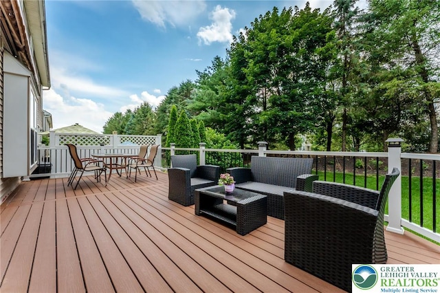 1536 Cambridge Dr, Lower Macungie Twp, PA 18062 - wooden terrace featuring an outdoor living space, outdoor dining area, and view of scattered trees