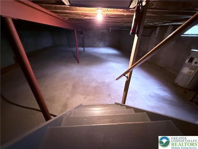 4395 E Texas Rd, Lower Macungie Twp, PA 18103 - stairway with concrete floors and electric water heater