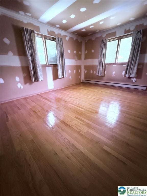 4395 E Texas Rd, Lower Macungie Twp, PA 18103 - empty room with baseboard heating and wood finished floors