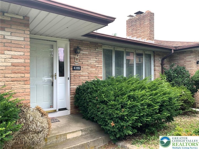 4395 E Texas Rd, Lower Macungie Twp, PA 18103 - entrance to property with a chimney and brick siding