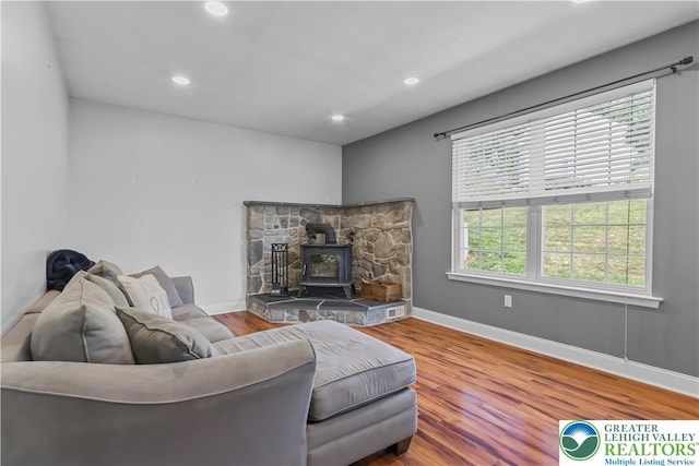 7725 Harbor Ct, Washington Twp, PA 18080 - living area with a wood stove, wood finished floors, and recessed lighting