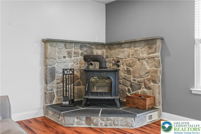 7725 Harbor Ct, Washington Twp, PA 18080 - detailed view of a wood stove and wood finished floors