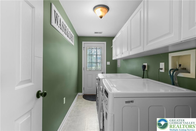 7725 Harbor Ct, Washington Twp, PA 18080 - laundry room featuring cabinet space and independent washer and dryer
