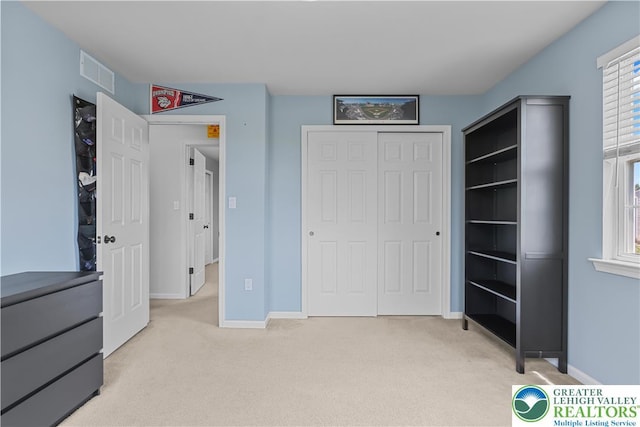 7725 Harbor Ct, Washington Twp, PA 18080 - unfurnished bedroom featuring light carpet and a closet