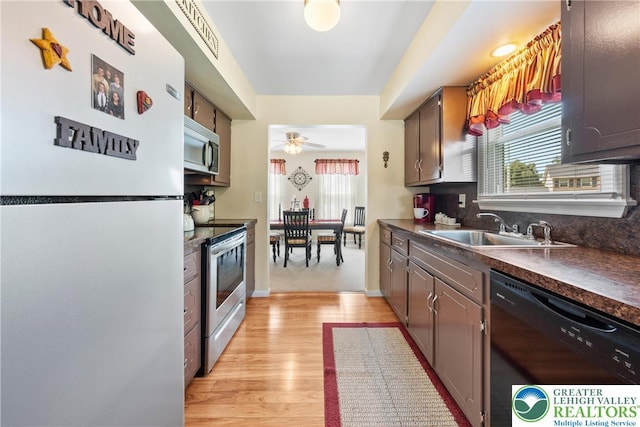 7 Rosemont Ct, Palmer Twp, PA 18045 - kitchen featuring freestanding refrigerator, dishwasher, stainless steel electric stove, dark countertops, and light wood-style floors