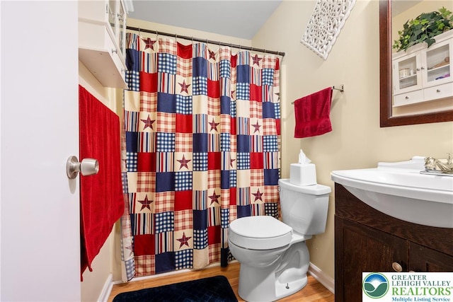 7 Rosemont Ct, Palmer Twp, PA 18045 - full bath with vanity, wood finished floors, and curtained shower