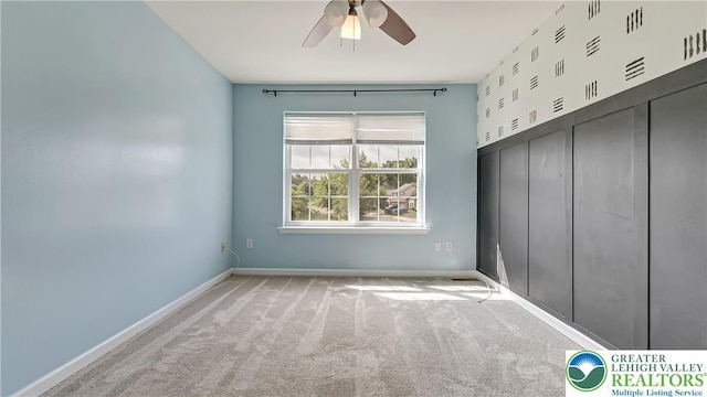 5587 Stonecroft Ln, Lower Macungie Twp, PA 18106 - unfurnished bedroom with carpet floors and a ceiling fan