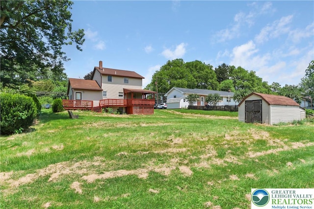 5396 Nor Bath Blvd, East Allen Twp, PA 18067 - view of grassy yard featuring a storage unit and a deck