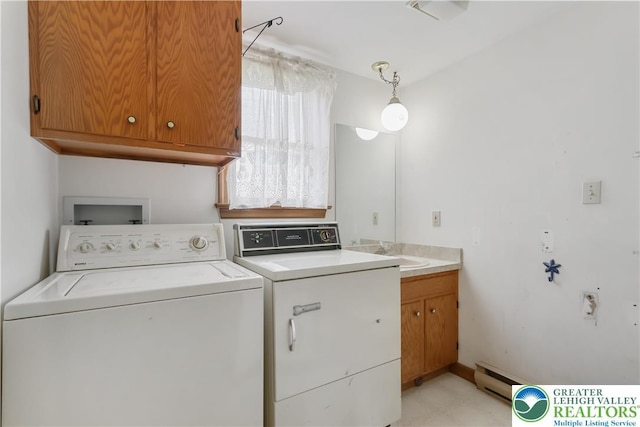 5396 Nor Bath Blvd, East Allen Twp, PA 18067 - washroom featuring washer and dryer, baseboard heating, and cabinet space