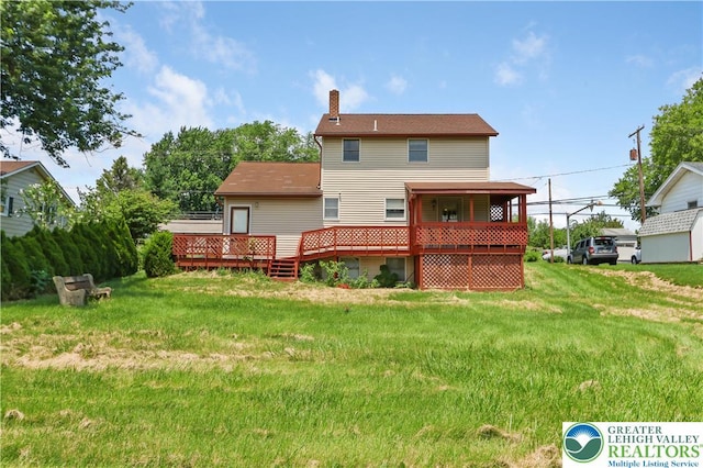 5396 Nor Bath Blvd, East Allen Twp, PA 18067 - back of property with a chimney, a deck, and a yard