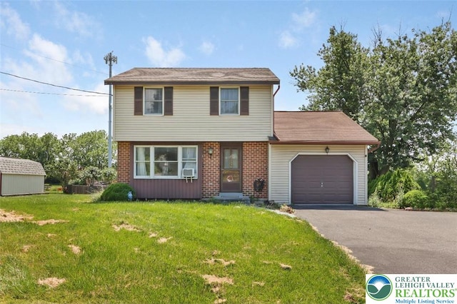 5396 Nor Bath Blvd, East Allen Twp, PA 18067 - view of front of home featuring a garage, a front lawn, asphalt driveway, and brick siding