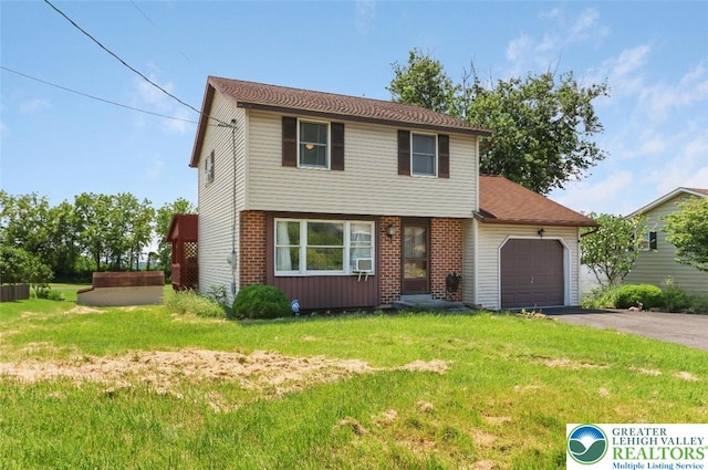 5396 Nor Bath Blvd, East Allen Twp, PA 18067 - view of front facade with an attached garage, driveway, and a front lawn