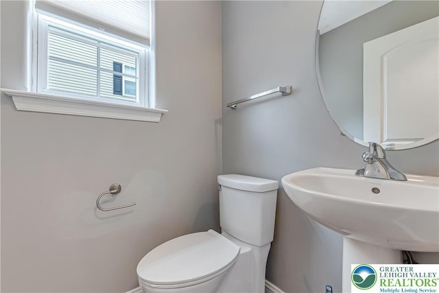 6945 Hunt Dr, Lower Macungie Twp, PA 18062 - bathroom with toilet and a sink