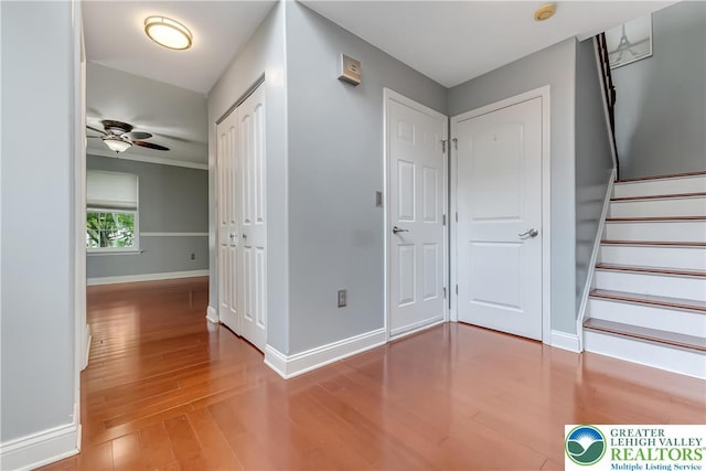6945 Hunt Dr, Lower Macungie Twp, PA 18062 - hall with wood finished floors and stairway