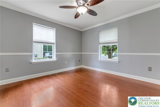 6945 Hunt Dr, Lower Macungie Twp, PA 18062 - spare room featuring a ceiling fan, wood finished floors, and ornamental molding