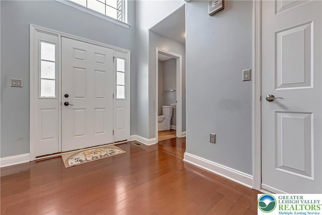 6945 Hunt Dr, Lower Macungie Twp, PA 18062 - foyer with wood finished floors and baseboards