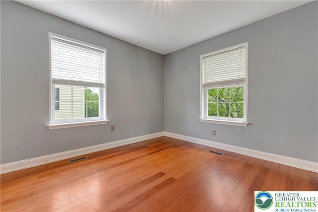 6945 Hunt Dr, Lower Macungie Twp, PA 18062 - spare room with plenty of natural light and wood-type flooring