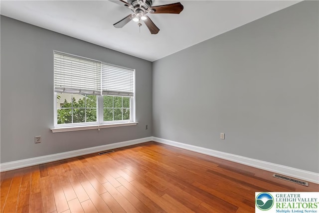 6945 Hunt Dr, Lower Macungie Twp, PA 18062 - empty room featuring ceiling fan and wood finished floors