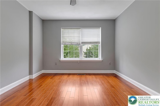6945 Hunt Dr, Lower Macungie Twp, PA 18062 - empty room featuring baseboards and light wood-type flooring