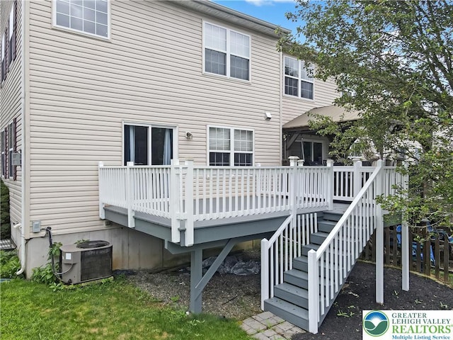 6945 Hunt Dr, Lower Macungie Twp, PA 18062 - rear view of property with a wooden deck