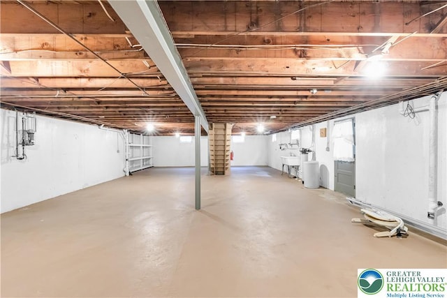 3032 W Woodlawn St, South Whitehall Twp, PA 18104 - unfinished basement featuring a water softener system and a sink