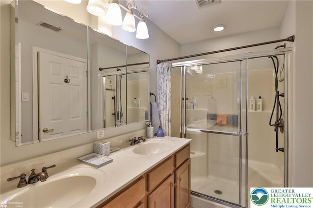 4076 Pine Hurst Dr, Allen Twp, PA 18067 - full bathroom with a shower stall and double vanity