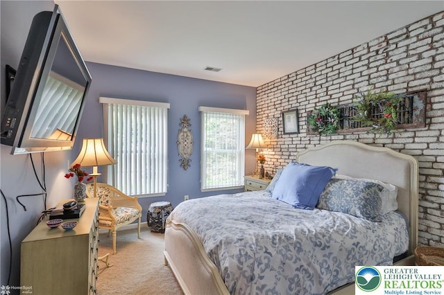 4076 Pine Hurst Dr, Allen Twp, PA 18067 - carpeted bedroom featuring brick wall and an accent wall