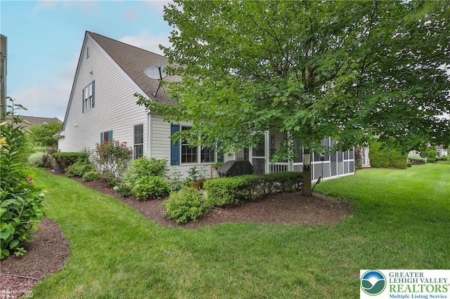4076 Pine Hurst Dr, Allen Twp, PA 18067 - view of property exterior featuring a yard and a shingled roof