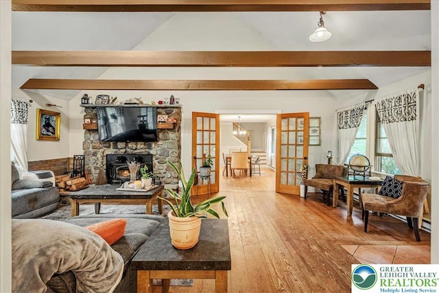 1079 Marshalls Creek Rd, Middle Smithfield Twp, PA 18302 - living area with french doors, hardwood / wood-style floors, and a chandelier