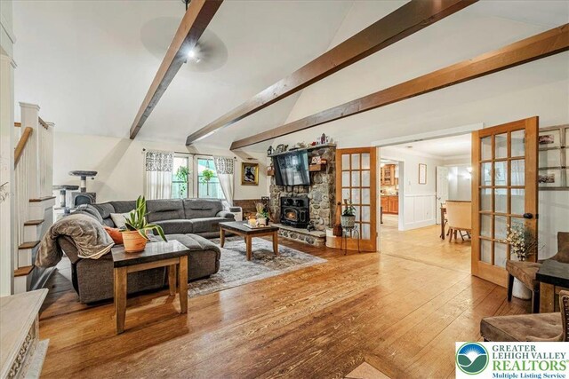 1079 Marshalls Creek Rd, Middle Smithfield Twp, PA 18302 - living room with french doors and hardwood / wood-style flooring