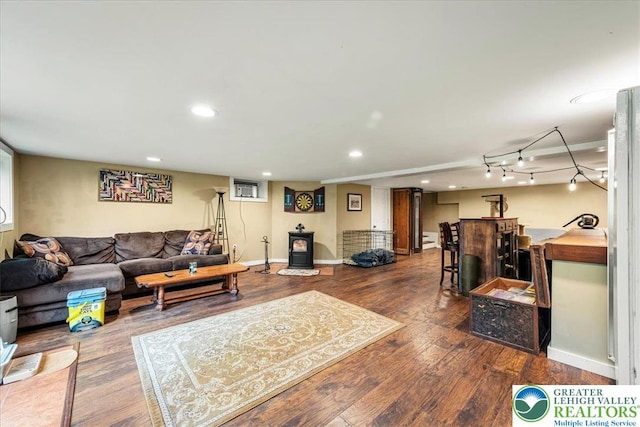 1079 Marshalls Creek Rd, Middle Smithfield Twp, PA 18302 - living room with a wood stove, wood finished floors, and recessed lighting