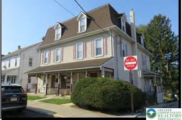 732 Washington Ave, Northampton Boro, PA 18067 - view of property featuring a porch and a chimney