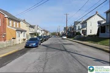 732 Washington Ave, Northampton Boro, PA 18067 - view of asphalt road featuring a residential view, sidewalks, and curbs