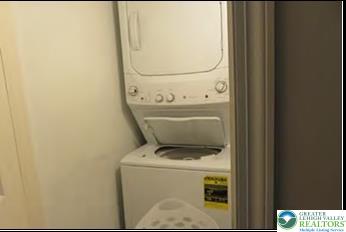 732 Washington Ave, Northampton Boro, PA 18067 - laundry area with stacked washer / dryer