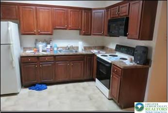 732 Washington Ave, Northampton Boro, PA 18067 - kitchen with white appliances and light countertops