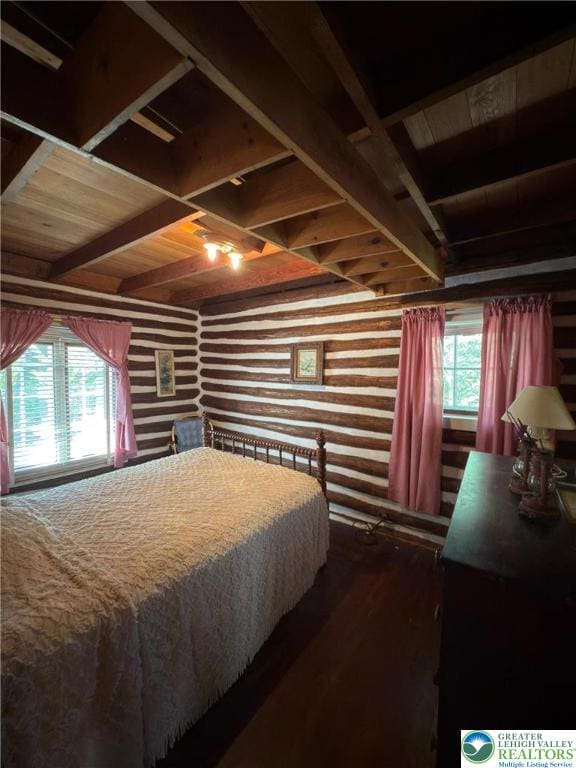 521 Resica Falls Rd, East Stroudsburg, PA 18302 - bedroom with a wooden ceiling with exposed beams and dark wood-style floors