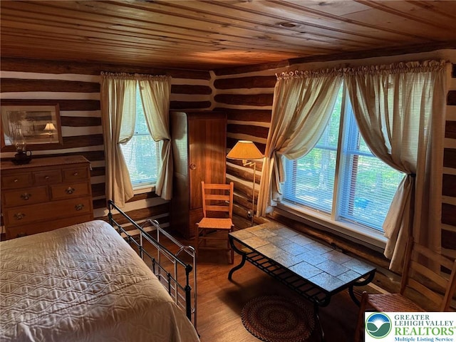 521 Resica Falls Rd, East Stroudsburg, PA 18302 - bedroom featuring wooden ceiling and wood finished floors