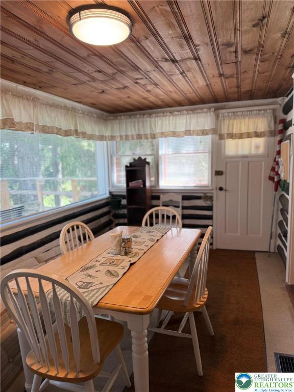 521 Resica Falls Rd, East Stroudsburg, PA 18302 - dining area with wooden ceiling and plenty of natural light