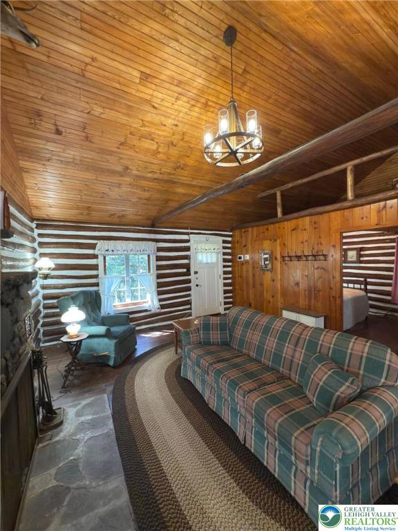 521 Resica Falls Rd, East Stroudsburg, PA 18302 - living room with wooden ceiling, a chandelier, and lofted ceiling
