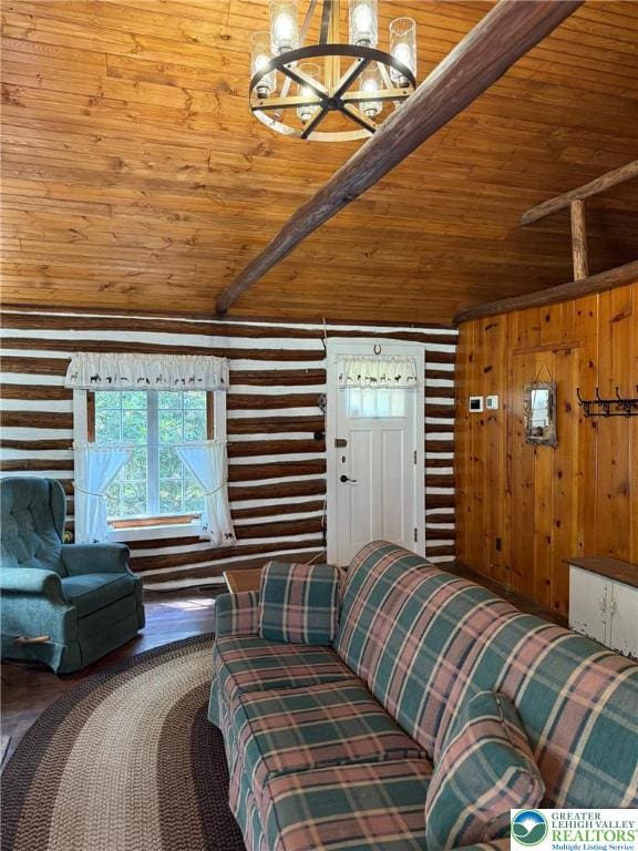 521 Resica Falls Rd, East Stroudsburg, PA 18302 - living room with wooden ceiling, a chandelier, vaulted ceiling, wooden walls, and wood finished floors