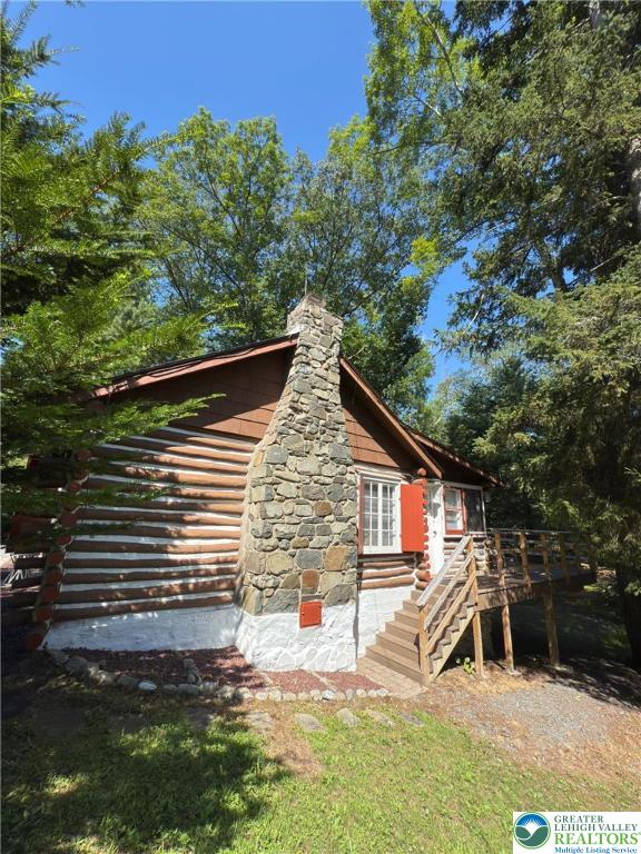 521 Resica Falls Rd, East Stroudsburg, PA 18302 - view of home's exterior with a deck