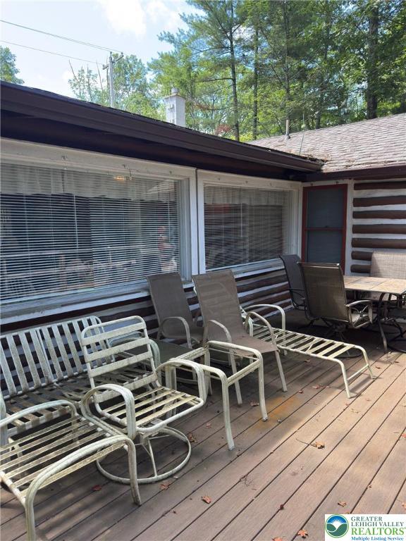 521 Resica Falls Rd, East Stroudsburg, PA 18302 - deck with outdoor dining area