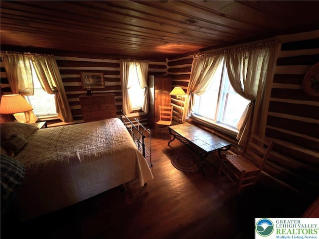 521 Resica Falls Rd, East Stroudsburg, PA 18302 - bedroom featuring wooden ceiling, multiple windows, and wood finished floors