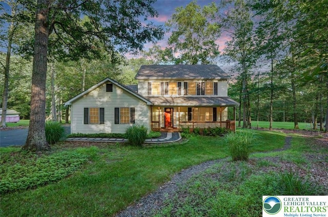119 Savage Trl, Smithfield Twp, PA 18301 - view of front of home featuring covered porch and a lawn
