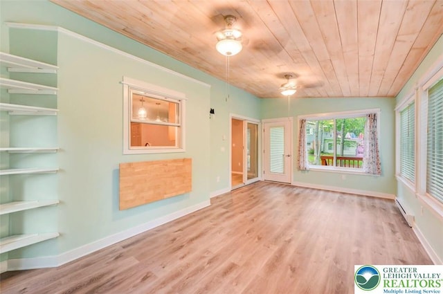 119 Savage Trl, Smithfield Twp, PA 18301 - empty room with wooden ceiling, a baseboard heating unit, and wood finished floors