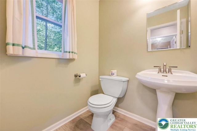 119 Savage Trl, Smithfield Twp, PA 18301 - half bathroom featuring toilet and baseboards
