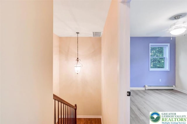 119 Savage Trl, Smithfield Twp, PA 18301 - stairway featuring baseboard heating and ceiling fan