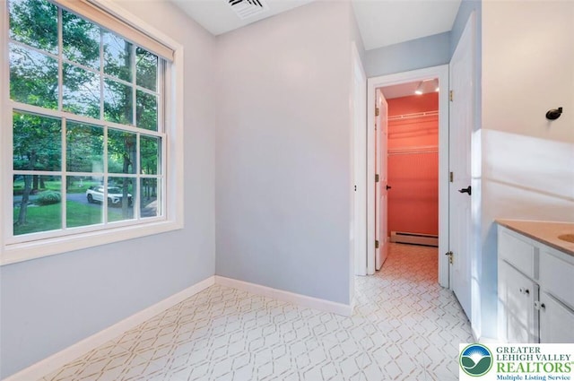 119 Savage Trl, Smithfield Twp, PA 18301 - bathroom featuring baseboard heating and vanity