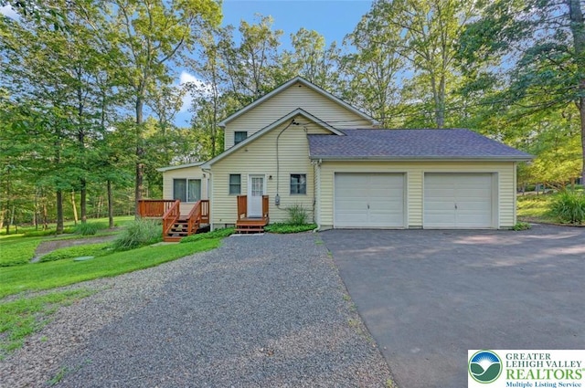 119 Savage Trl, Smithfield Twp, PA 18301 - view of front facade featuring driveway, a garage, and a deck